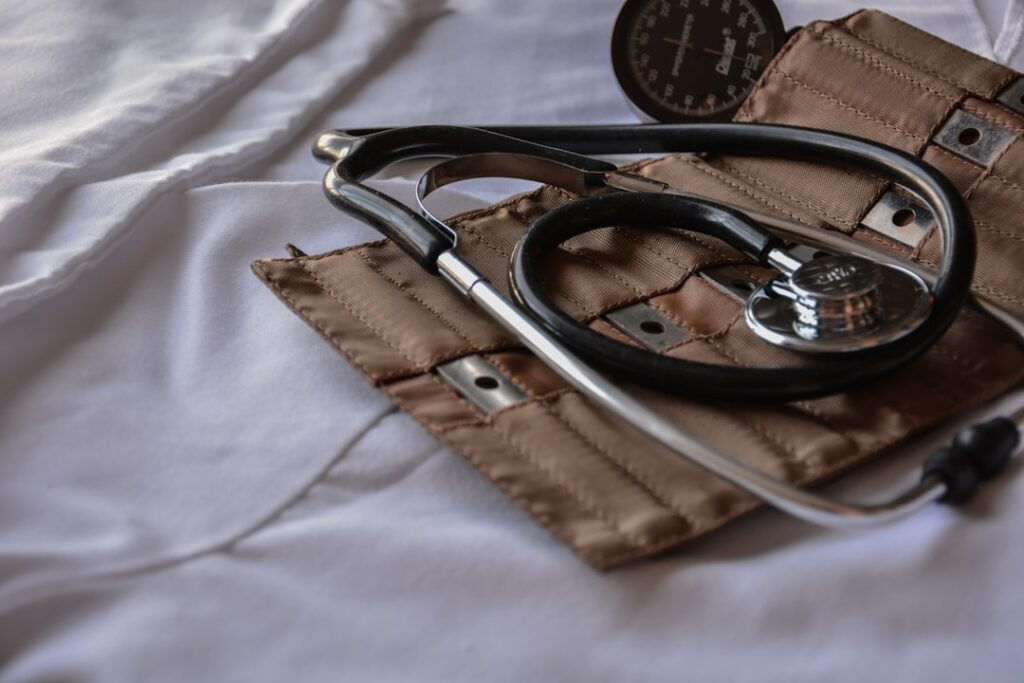 Close-up of various medical uniforms showcasing different pocket designs and storage features.