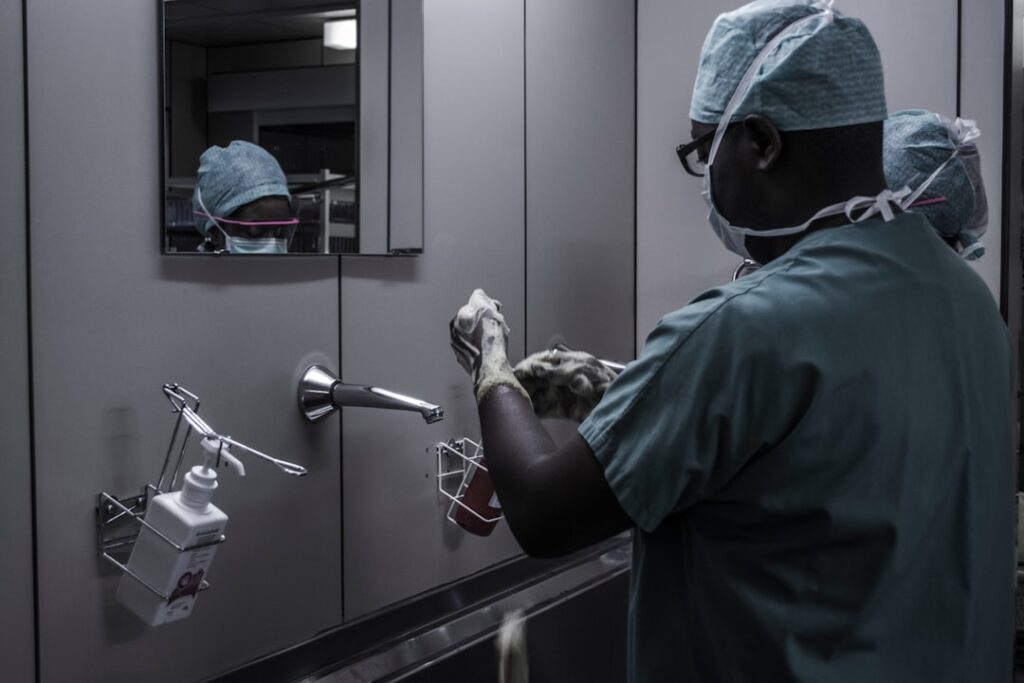 A neatly arranged set of colorful medical scrubs hanging on a rack, showcasing their professional appearance.